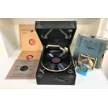 COLUMBIA CASED TRAVELLING GRAMOPHONE in a hard shell textured case, numbered 112A, with a disc