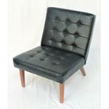 RETRO 20TH CENTURY MIES VAN DE ROHE STYLE CHAIR in black vinyl with a button back and seat, standing