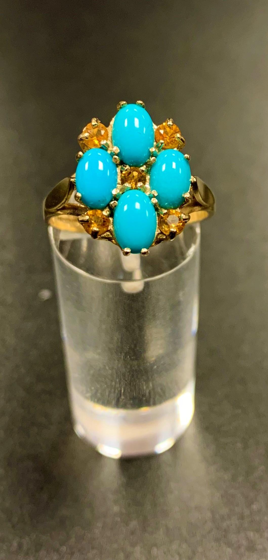 CITRINE AND TURQUOISE CLUSTER RING the four cabochon turquoise stones interspersed with five round