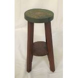 NORTH AFRICAN STYLE STOOL with a circular copper seat with chased decoration, standing on four