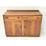 LIGHT OAK SIDEBOARD with a raised back above two frieze drawers with two cupboard doors below,