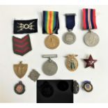 WWI MEDAL named to 137974 Pte. J.G.Barrie M.G.C. two 1939-45 war medals, one with a ribbon,
