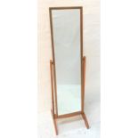 STAINED CHEVAL MIRROR with an oblong plate on a beech stand with splayed supports, 137.5cm high