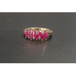 RUBY AND DIAMOND CLUSTER DRESS RING the seven marquise rubies at alternating higher and lower