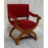 SAVONAROLA TYPE OAK ARMCHAIR with a deep padded back and arms above a stuffover seat on a double X