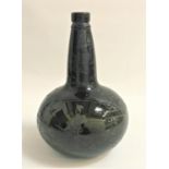 GEORGIAN GREEN GLASS WINE BOTTLE of onion shape with an inverted base, with later Victorian