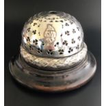 SILVER MOUNTED TABLE BELL the domed cover with pierced clover decoration and shield cartouche to