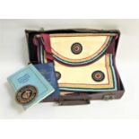 COLLECTION OF MASONIC REGALIA contained in a tan leather case including a black watered silk