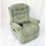 CELEBRITY RISE AND RECLINE ELECTRIC ARMCHAIR covered in a patterned green material, with power