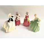 FOUR ROYAL DOULTON FIGURINES comprising Autumn Breezes HN2147, 19cm high, Christmas Morn HN1992,