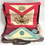 COLLECTION OF MASONIC REGALIA contained in a mahogany case including three aprons, two shoulder