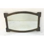 RECTANGULAR SHAPED WALL MIRROR with a hammered brass frame, the corners with leaf decoration