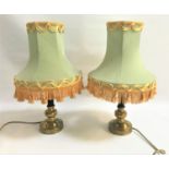 PAIR OF TABLE LAMPS each raised on circular brass stepped bases with ribbed columns and duck egg