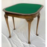 MAHOGANY D SHAPED CARD TABLE with a moulded fold over swivel top opening to reveal a baize lined