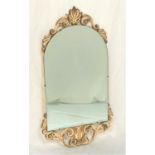 ATSONEA WALL MIRROR with an arched bevelled plate and pierced scroll frame, 84cm high