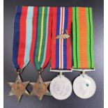 WWII GROUP OF FOUR MEDALS comprising The 1039-1945 Star, The Pacific Star, The War Medal with