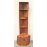 G PLAN TEAK NARROW CORNER UNIT with a curved plain top above three shelves, the shaped base with a