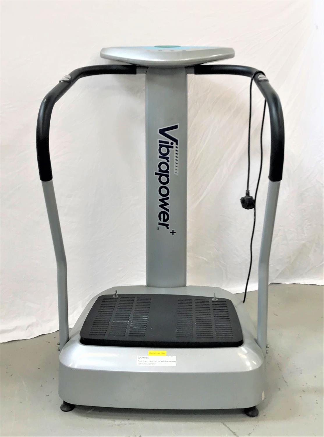 VIBRAPOWER POWER PLATE with hand grips and pulse sensors, digital display with settings for speed,