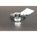 CERTIFIED AQUAMARINE AND BLUE DIAMOND RING the central octagon cut Idar aquamarine weighing 1.99cts,