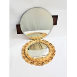 ART DECO STYLE MIRROR with a circular bevelled plate flanked by offset stained ribbed wood panels,