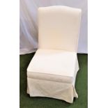 BEDROOM SIDE CHAIR with a shaped padded back and stuffover seat, standing on squat bun feet, covered