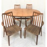 G PLAN TEAK D END DINING TABLE with a pull apart top revealing a fold out leaf, standing on twin