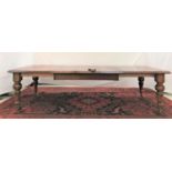 VICTORIAN MAHOGANY EXTENDING TABLE with a moulded top and three extra leaves above a plain frieze,