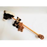 MERRY THOUGHT HOBBY HORSE with a plush head on a pole with handles and wheels, 90cm long, together