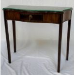 WALNUT SIDE TABLE with a shaped top above a central frieze drawer, standing on straight shaped