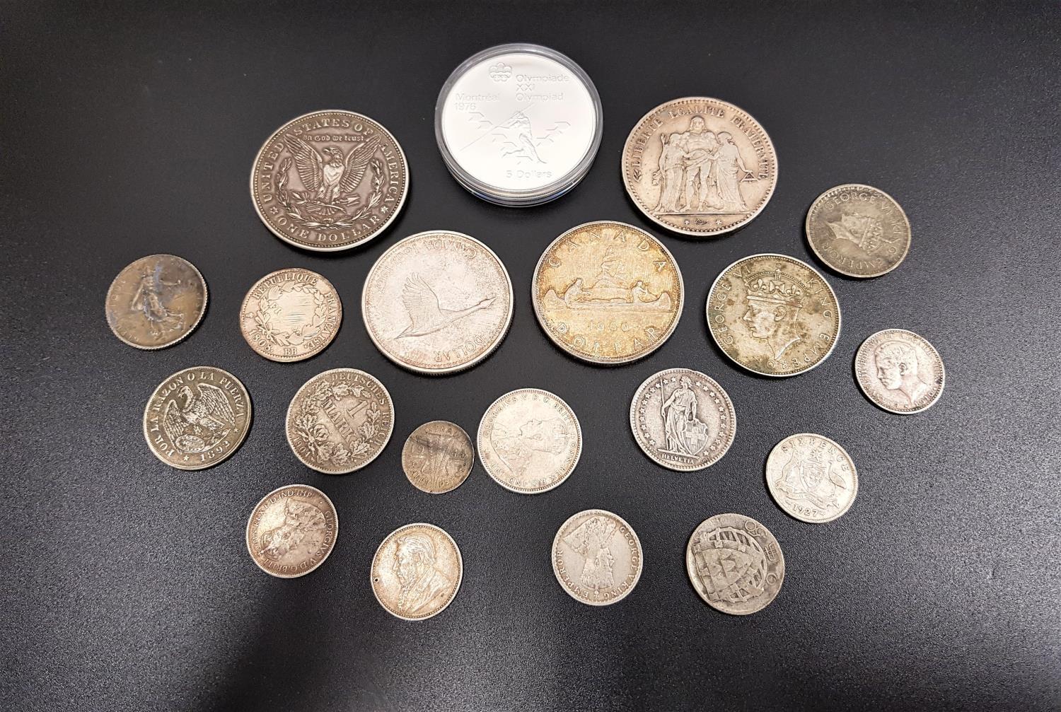 SELECTION OF WORLD SILVER COINS with silver contents ranging from 500 to 925, including a Proof