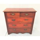 EDWARDIAN MAHOGANY CHEST with a moulded top above two short and three long drawers above a shaped