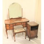 BEITHCRAFT FIGURED WALNUT SERPENTINE DRESSING TABLE with a shaped bevelled mirror back above an