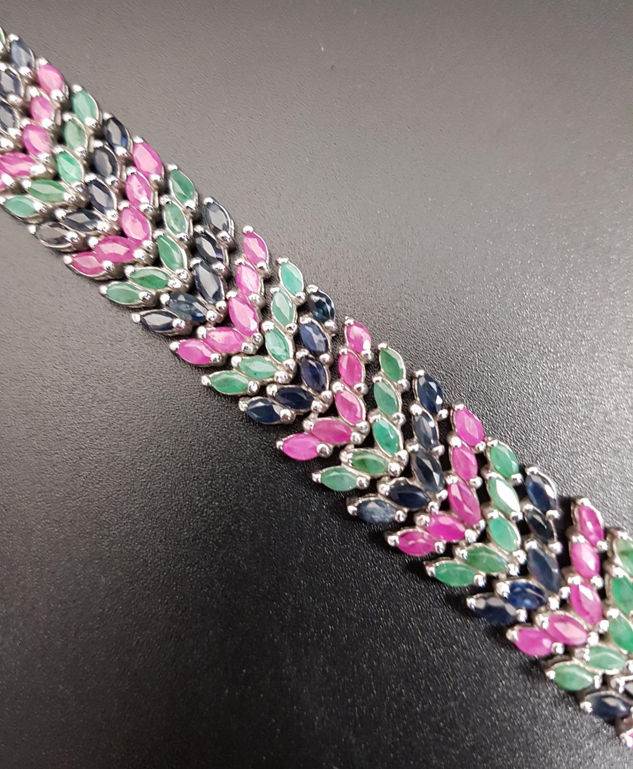 SAPPHIRE, RUBY AND EMERALD BRACELET the multiple marquise cut gemstones in alternating rows, in