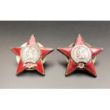 TWO WWII SOVIET RUSSIAN CAP BADGES the Soviet Order Of The Red Star, in white metal and red