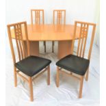 ITALIAN BEECH EXTENDING TABLE WITH CHAIRS the table with a shaped pull apart top and extra leaf,