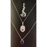 PINK TOPAZ AND DIAMOND HEART SHAPED PENDANT in nine carat gold and on nine carat gold chain;