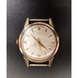 LATE 1950s TUDOR ROYAL GENTLEMEN'S NINE CARAT GOLD CASED WRISTWATCH the dial with Arabic 3, 6, 9 and