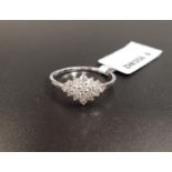 CERTIFIED DIAMOND CLUSTER RING the sixteen diamonds in navette shaped setting, on platinum shank,