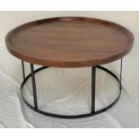CIRCULAR TEAK OCCASIONAL TABLE with a raised rim, standing on a circular metal frame, 45.5cm x 90.