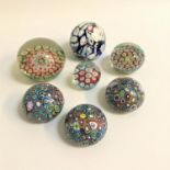 SEVEN MILLEFIORI GLASS PAPERWIGHTS of various sizes (7)