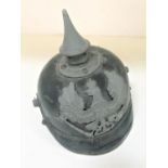 WWI IMPERIAL GERMAN PICKELHAUBE of leather construction with steel furniture, the interior marked 54