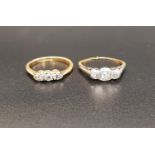 TWO DIAMOND THREE STONE RING one with diamonds totaling approximately 0.15cts on eighteen carat gold