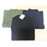 TWO CASHMERE HIGH NECK JUMPERS the navy blue jumper marked '100% Cashmere Made in Scotland', the