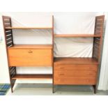 1970'S LADDERAX TEAK MODULAR WALL UNIT comprising three ladder style uprights, a bureau, three