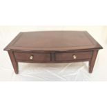 SHAPED WALNUT OCCASIONAL TABLE with a quarter veneered top above two frieze drawers, standing on