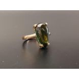 GREEN TOURMALINE SINGLE STONE RING the cabochon pear cut tourmaline in nine carat gold, ring size