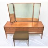 A.YOUNGER LTD TEAK DRESSING TABLE with a triple mirror back above an arrangement of six drawers,