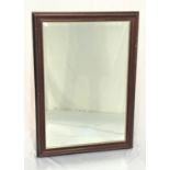 LARGE OBLONG WALL MIRROR with a mahogany frame and a bevelled plate, 101.5cm x 72.5cm