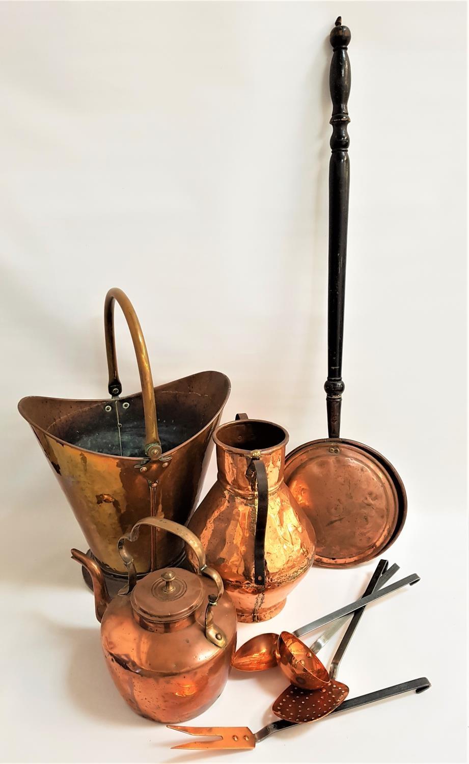 SELECTION OF VINTAGE COPPER WARE including a helmet coal scuttle with a swing handle, warming pan