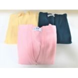 TWO PRINGLE OF SCOTLAND LAMSWOOL CREW NECK CARDIGANS one in pink with gold buttons (38ins/97cms),